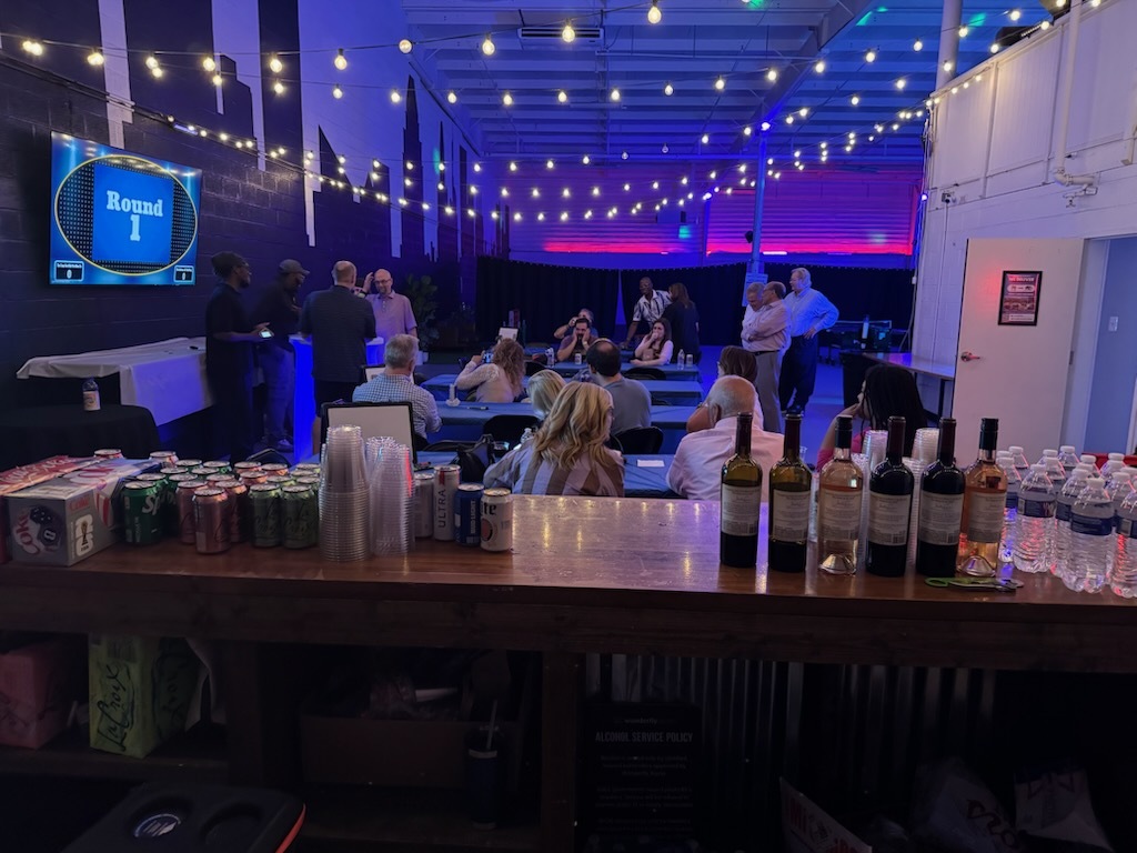 Indoor evening event with bar service