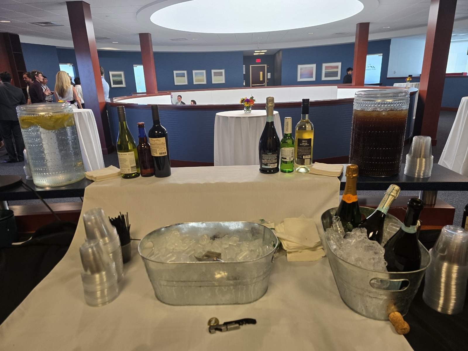 Bar tools, bottles, and service supplies prepared for an event